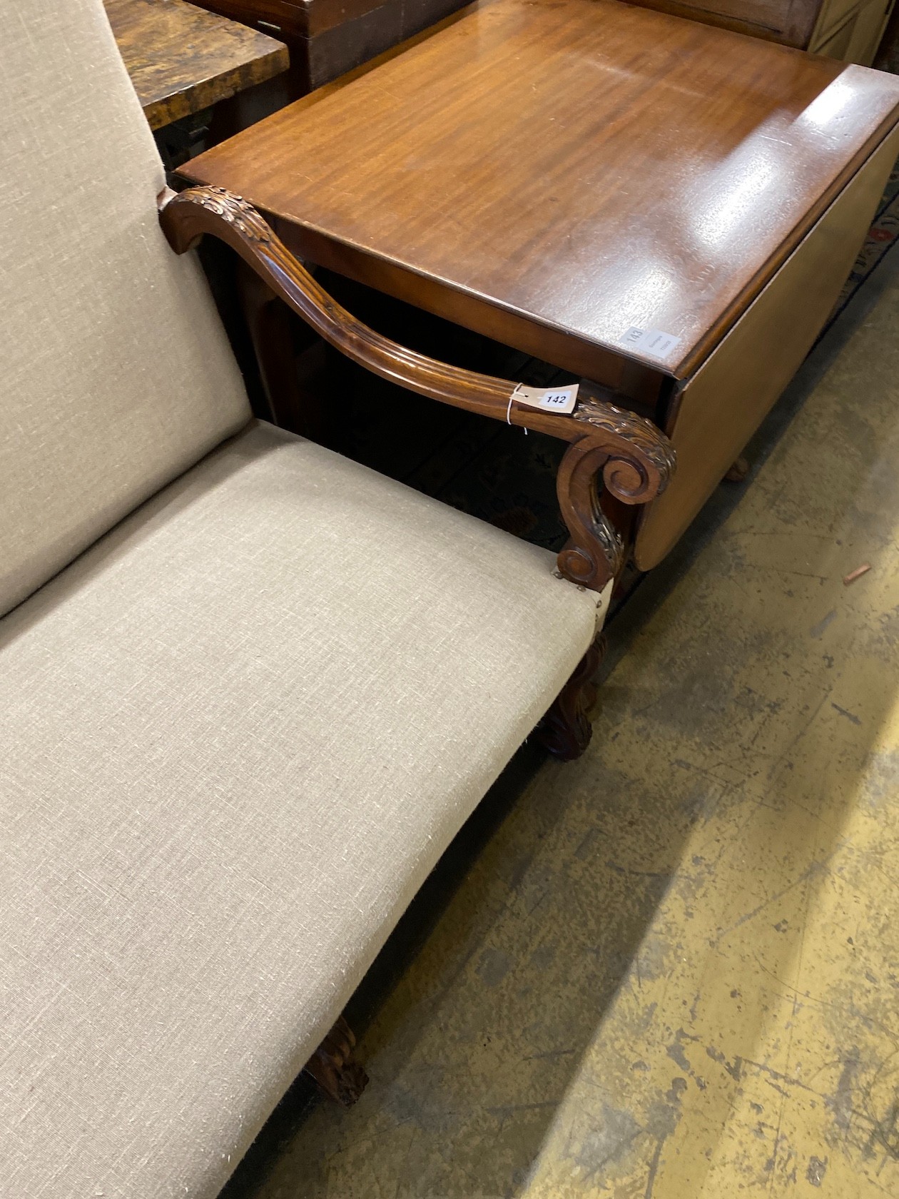 A Louis XVI style walnut settee recently upholstered in studded natural fabric, length 170cm, depth 74cm, height 116cm